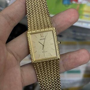 1980s Seiko Dolce Mesh Band Square Watch
Gold-Toned Case